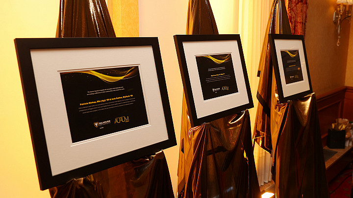 Framed awards on display at the event.